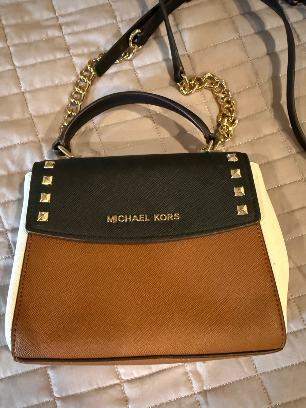 Michael Kors small saffiano leather top-handle crossbody with gold pyramid studs